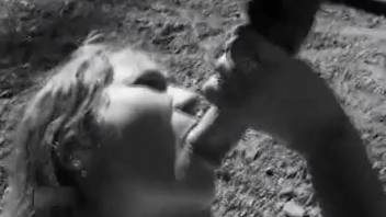 Fantastic black-and-white blowjob film featuring an attractive zoophile