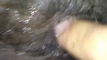 Pair of digits delving deep into that stunning cavern