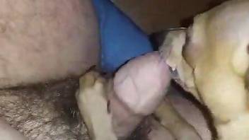 Beast licking a hairy and uncut cock in a hot movie