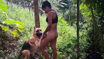 Sun-kissed beauty bangs a dog in a taboo porn vid